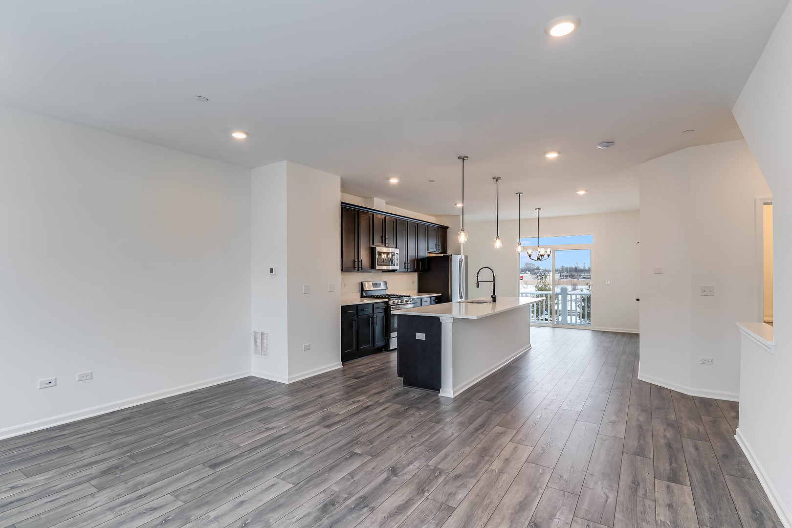 1552 Slade Way Des Plaines, IL 60018 - Photo 10 of 32 a large kitchen with a lot of counter space and stainless steel appliances