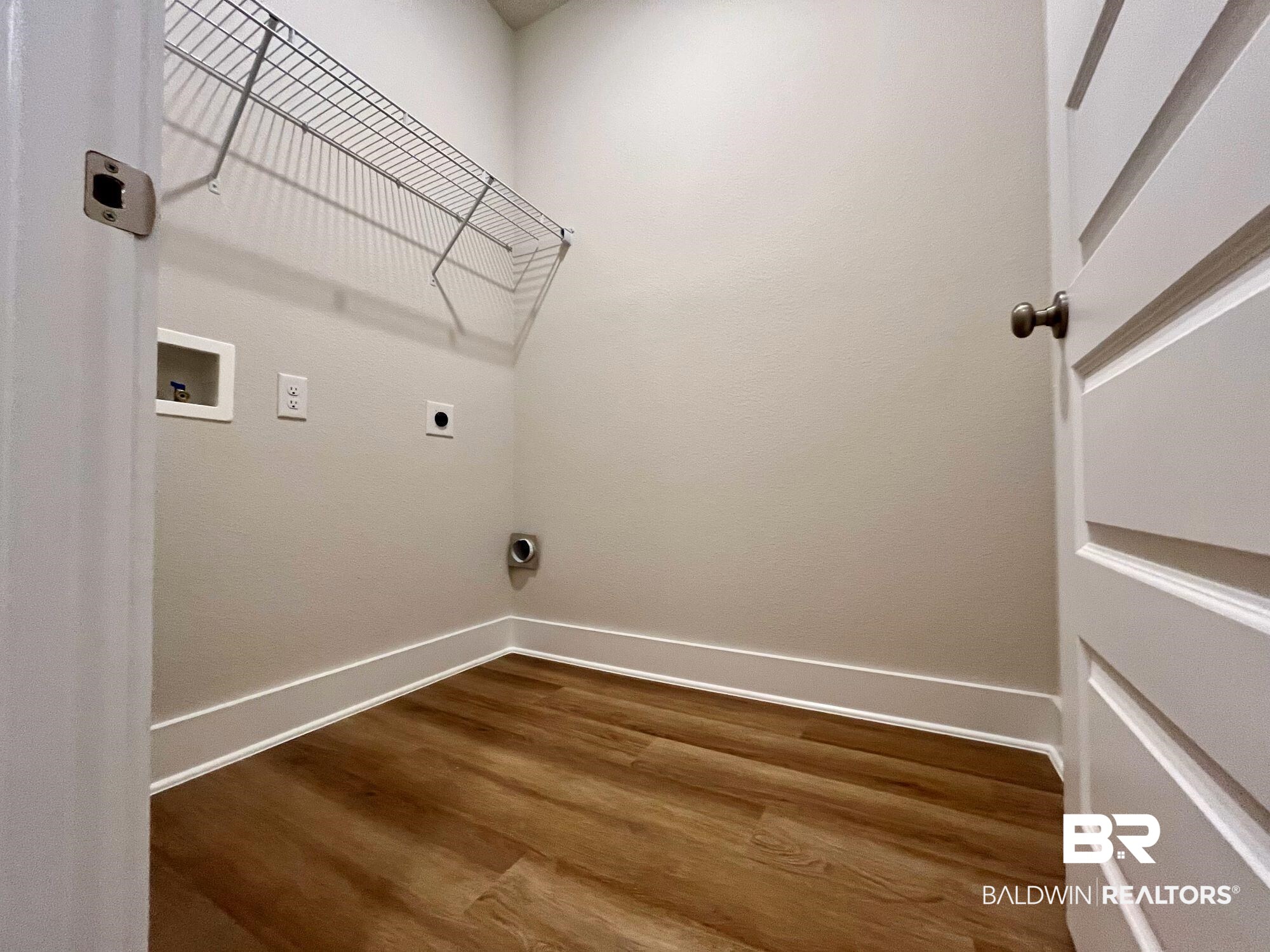 330 Barndling Street Fairhope, AL 36532 - Photo 23 of 31 Laundry area featuring hookup for an electric dryer, hookup for a washing machine, and hardwood / wood-style flooring