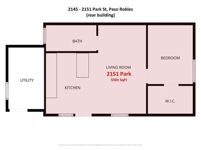 a backyard of a house with sofas table and chairs