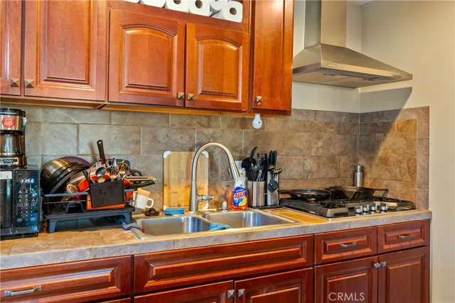 an aerial view of multiple houses with yard