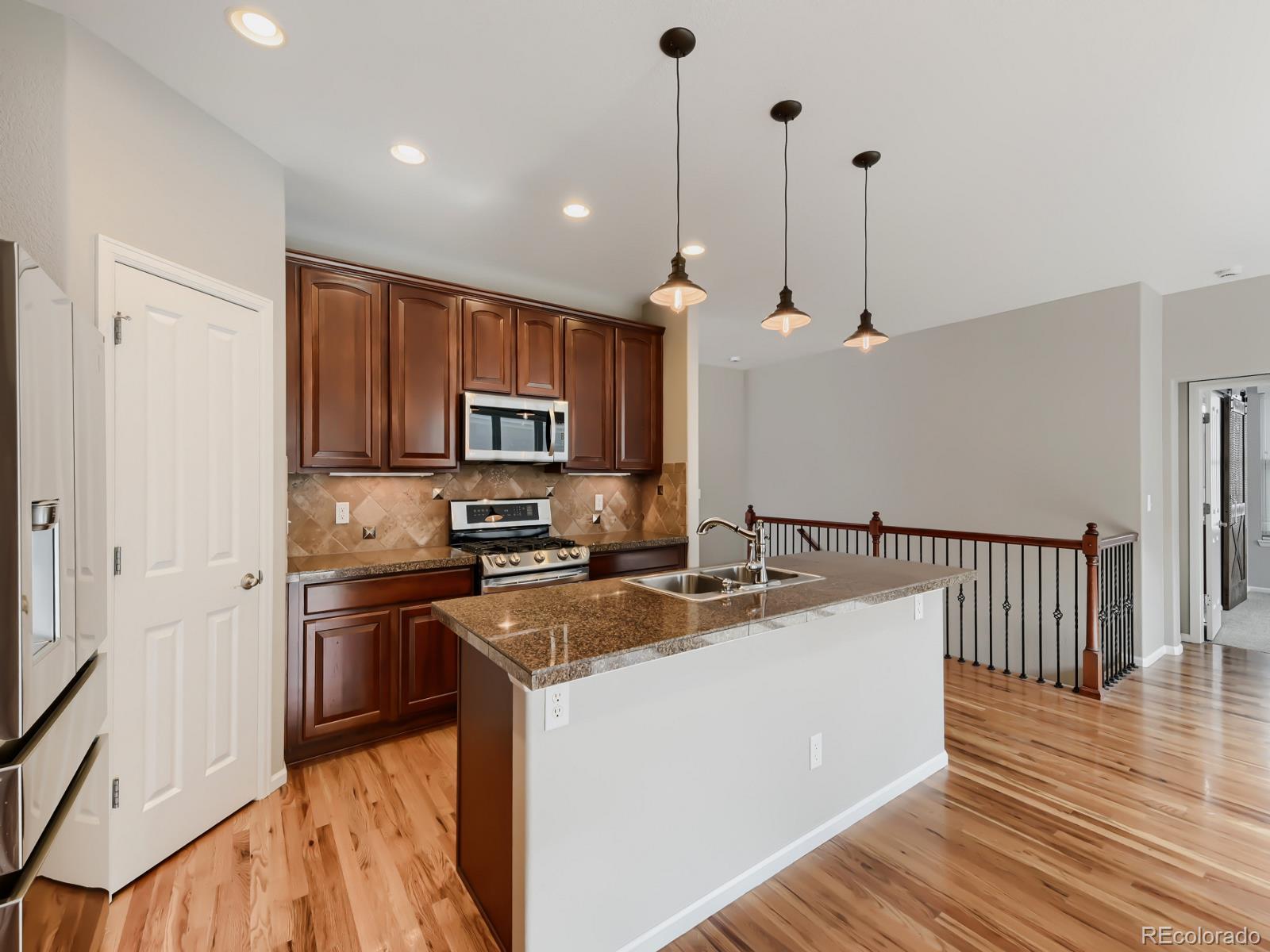1520 Red Poppy Way Brighton, CO 80601 - Photo 4 of 22