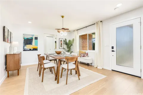 a view of a dining room with furniture