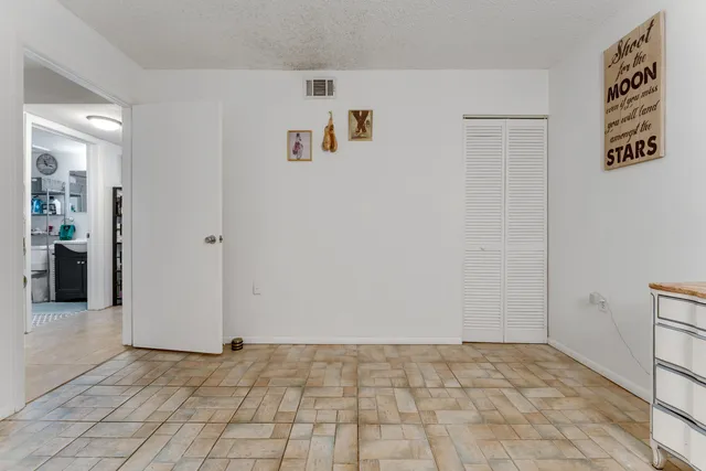 a swimming pool with outdoor seating and yard