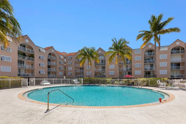 a kitchen with refrigerator and window