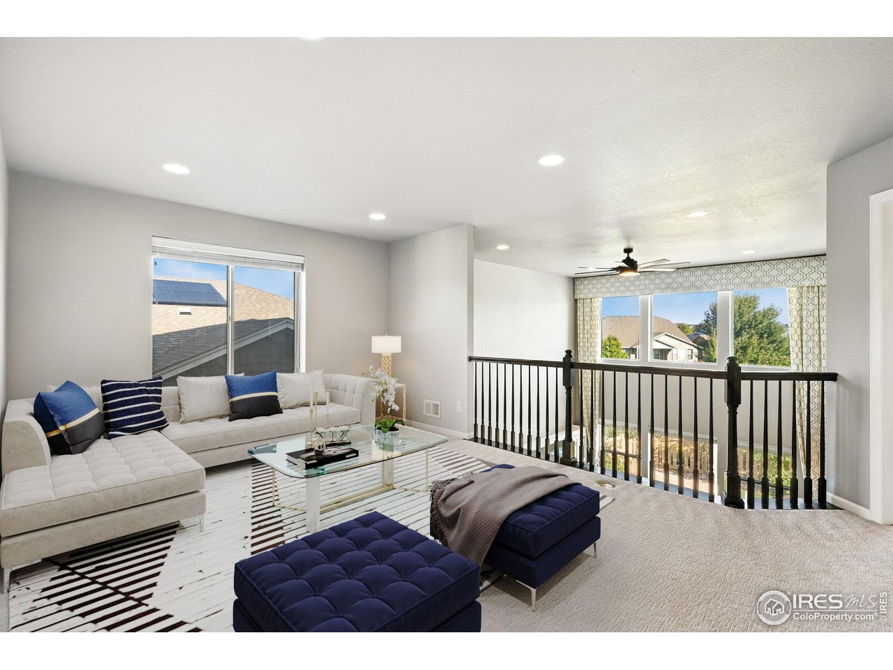 6420 Tuxedo Park Road Timnath, CO 80547 - Photo 12 of 44 a living room with furniture