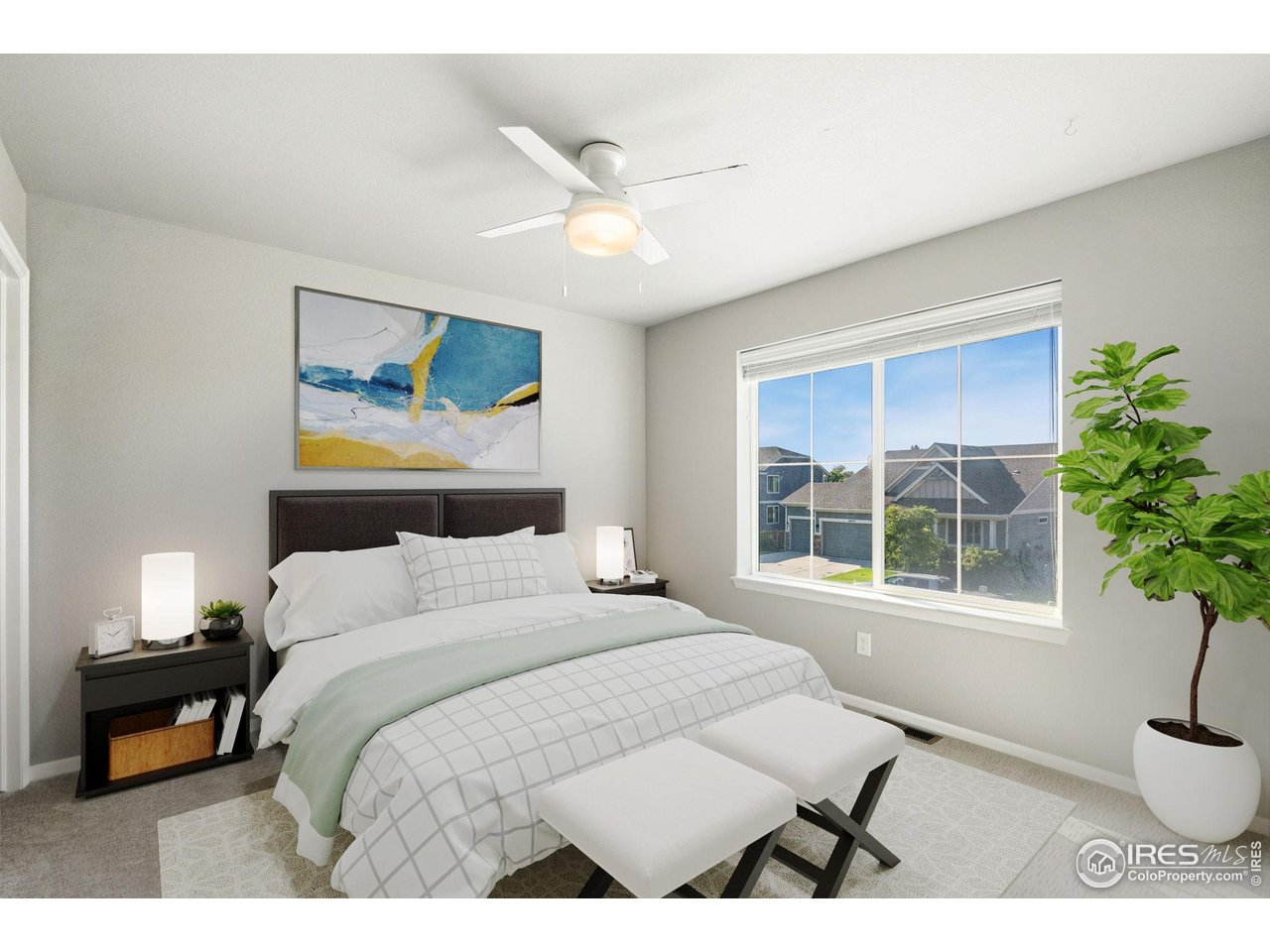 6420 Tuxedo Park Road Timnath, CO 80547 - Photo 20 of 44 a bedroom with a bed and a window