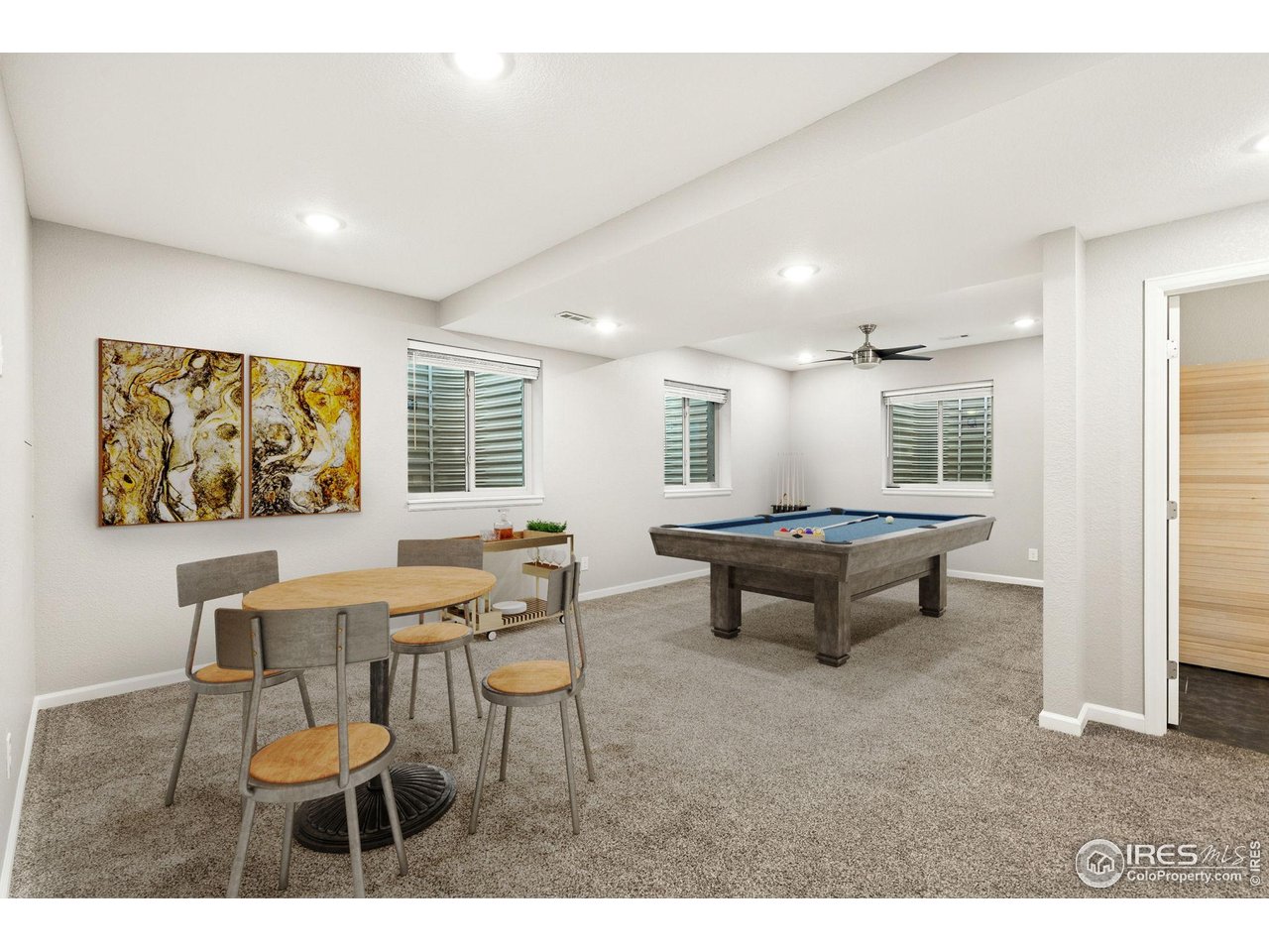 6420 Tuxedo Park Road Timnath, CO 80547 - Photo 25 of 44 a workspace with furniture and window