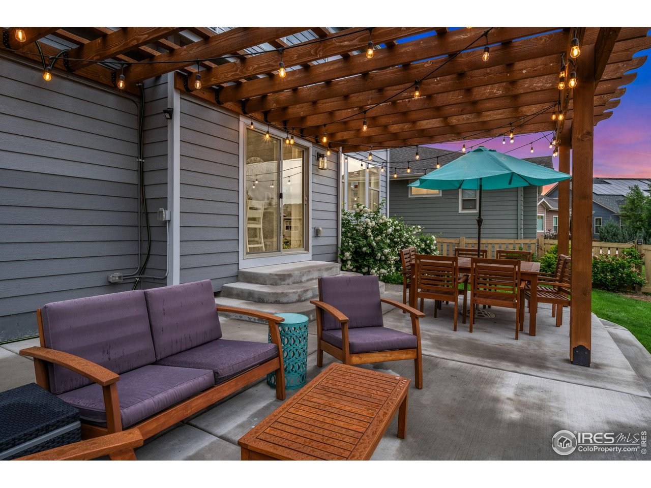 6420 Tuxedo Park Road Timnath, CO 80547 - Photo 30 of 44 a outdoor living space with patio furniture and a potted plant