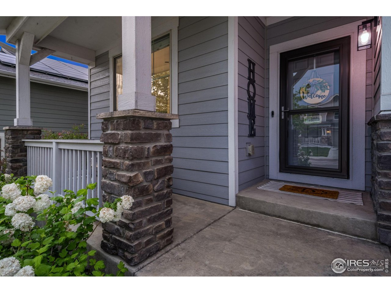 6420 Tuxedo Park Road Timnath, CO 80547 - Photo 36 of 44 a view of front door of house