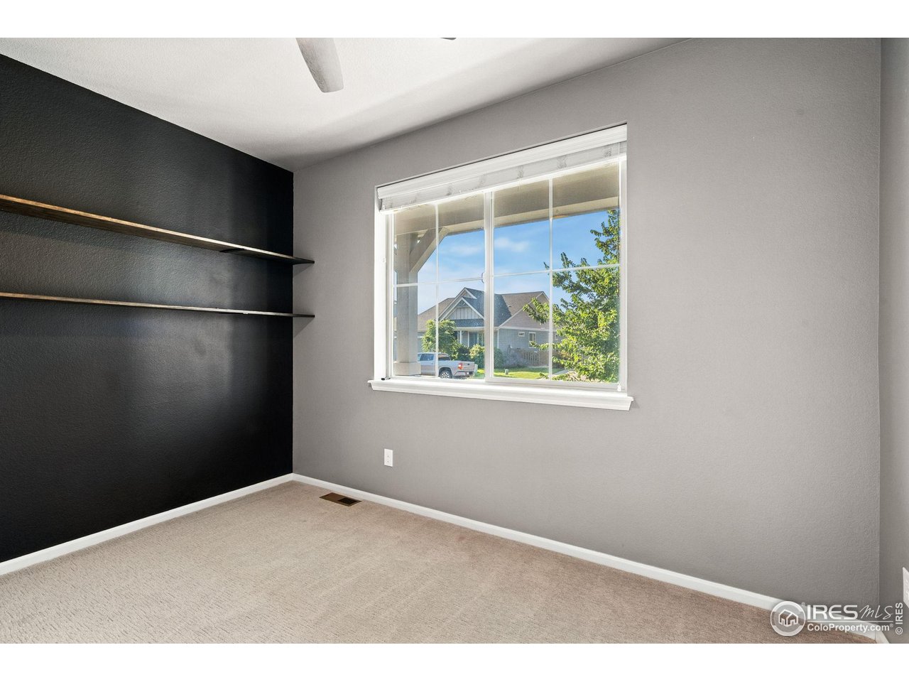 6420 Tuxedo Park Road Timnath, CO 80547 - Photo 37 of 44 a view of an empty room with a window