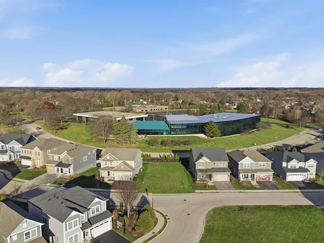 an aerial view of a house with a outdoor space