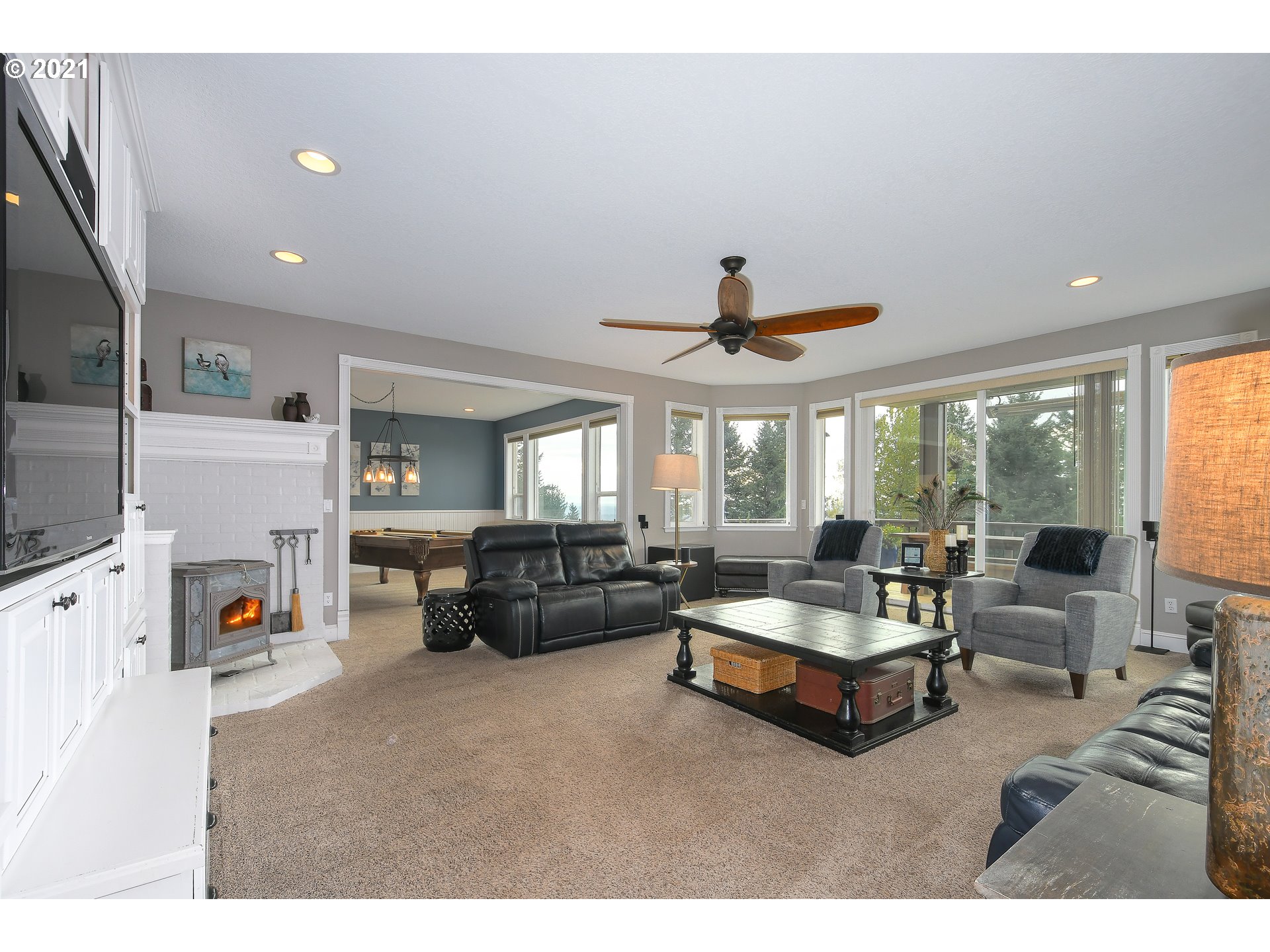 28400 Northeast Hancock Road Camas, WA 98607 - Photo 11 of 32 a living room with furniture and a fireplace