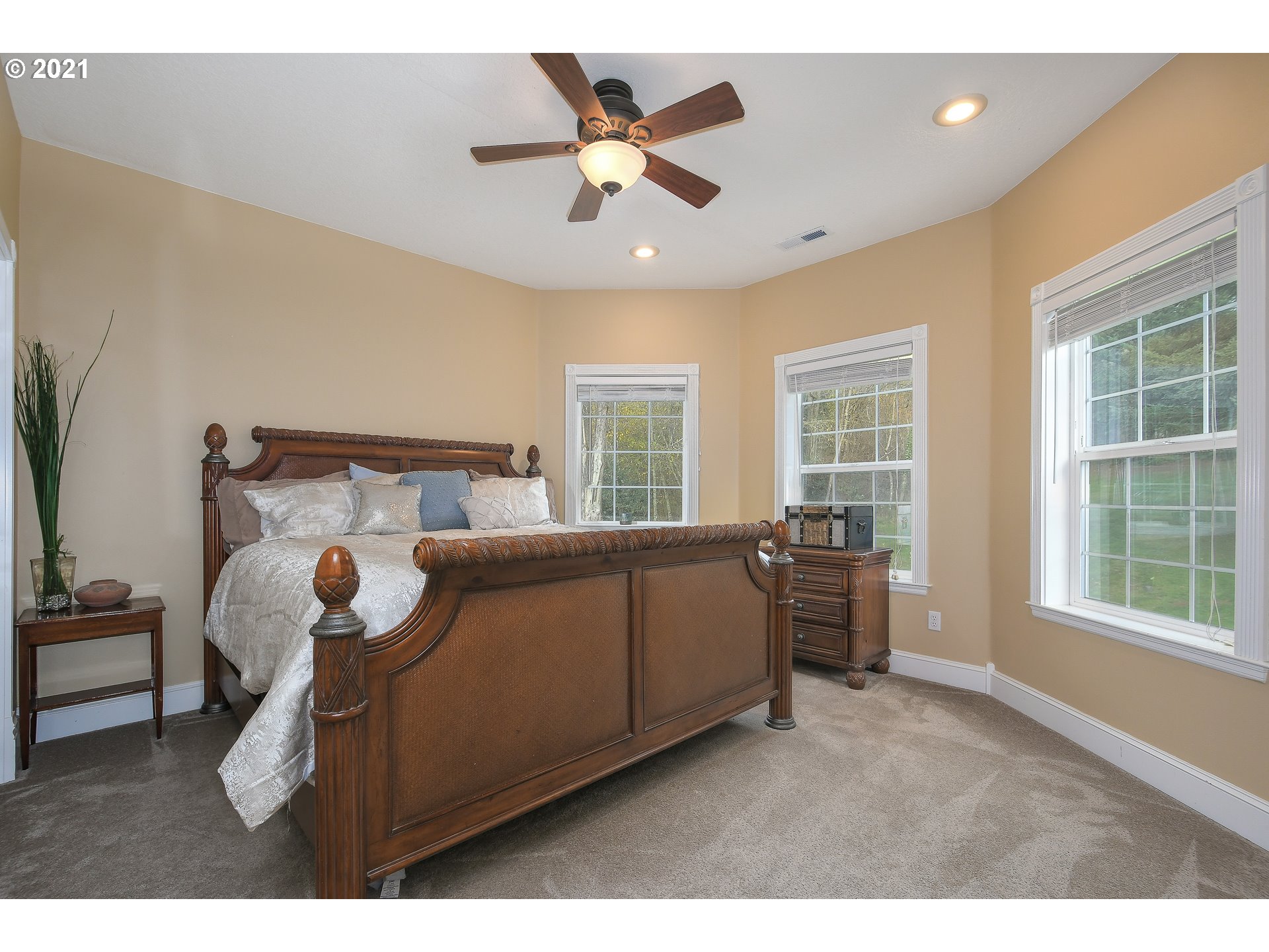 28400 Northeast Hancock Road Camas, WA 98607 - Photo 23 of 32 a bed room with a bed and a window
