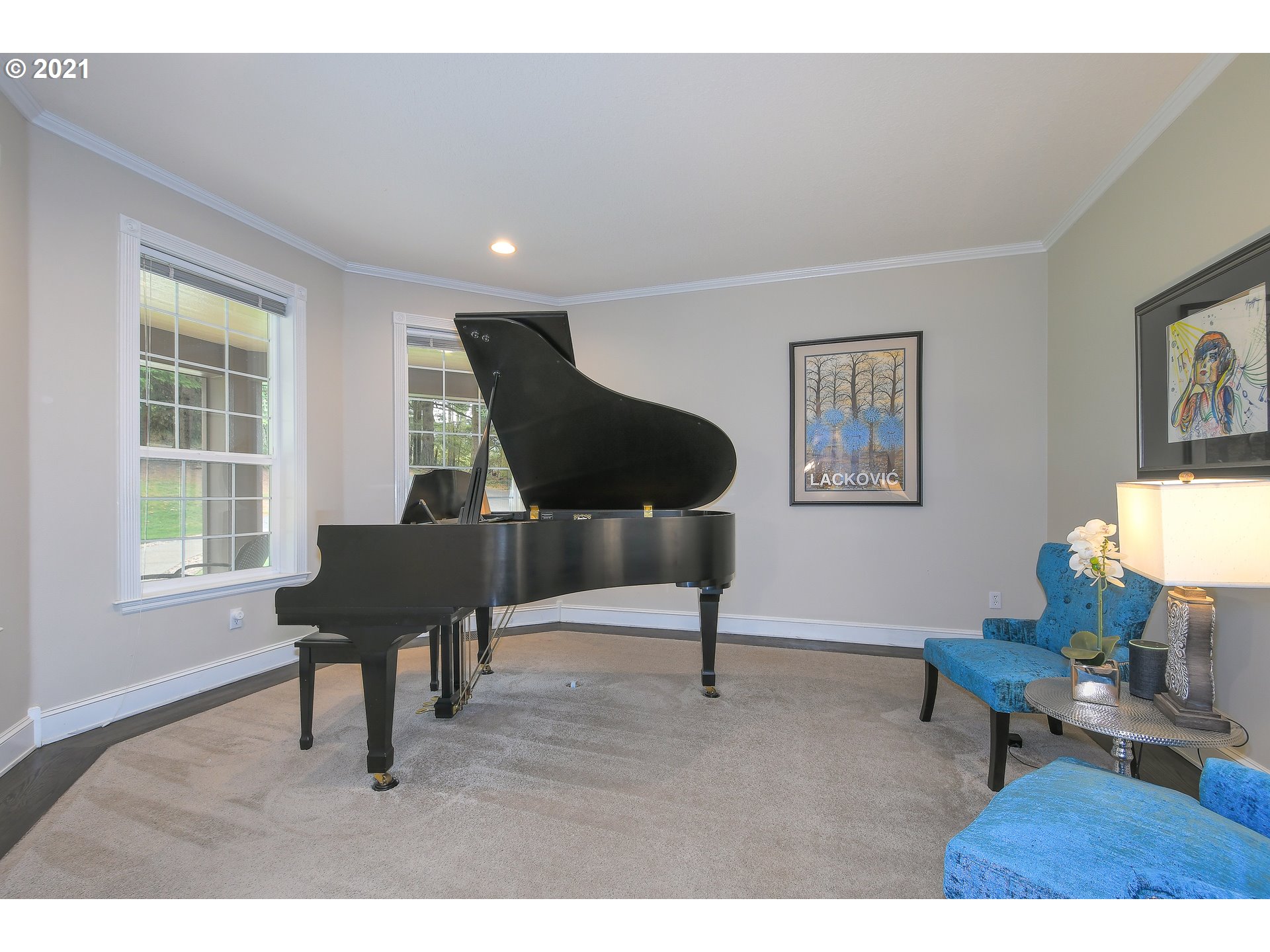 28400 Northeast Hancock Road Camas, WA 98607 - Photo 5 of 32 a living room with furniture a piano and a window
