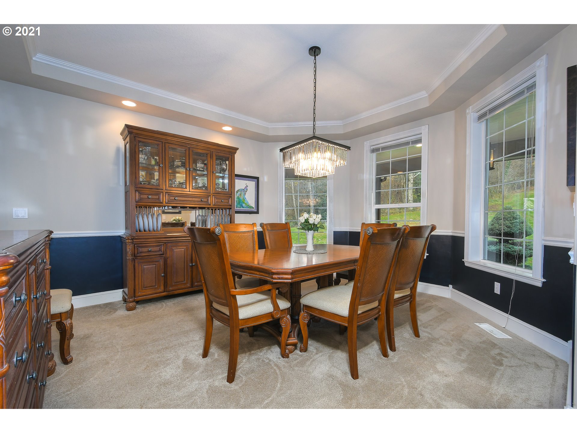 28400 Northeast Hancock Road Camas, WA 98607 - Photo 6 of 32 a dining room with furniture a chandelier and window