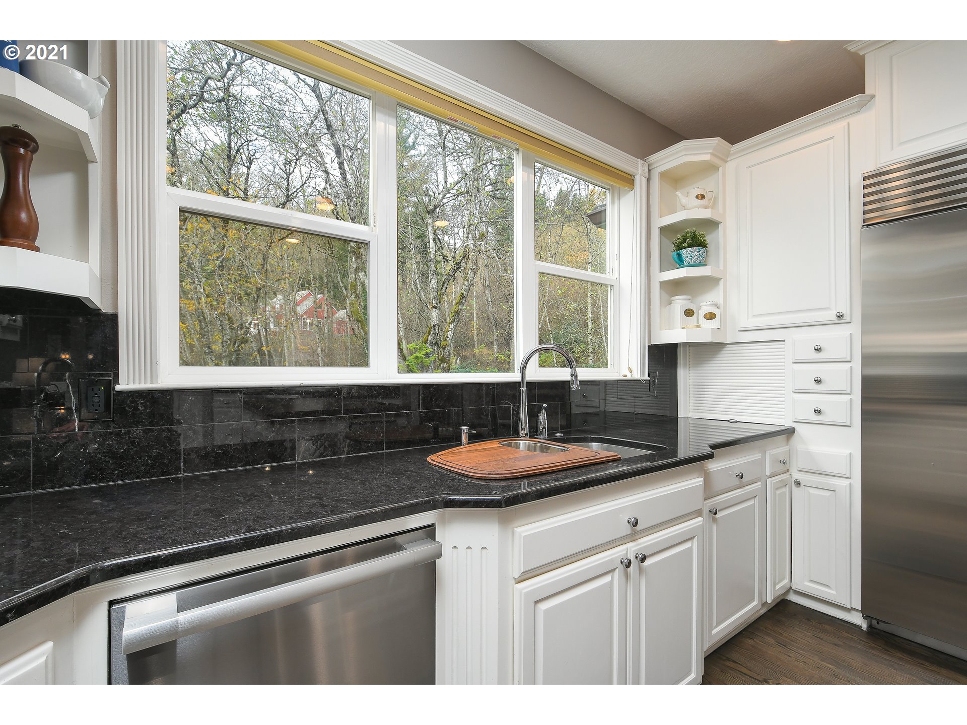 28400 Northeast Hancock Road Camas, WA 98607 - Photo 9 of 32 a kitchen with granite countertop a sink and a window