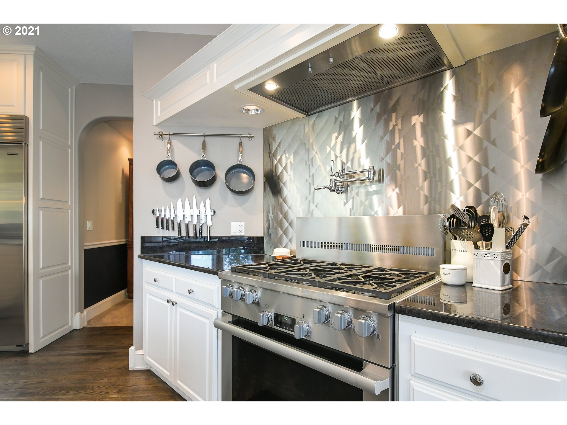 28400 Northeast Hancock Road Camas, WA 98607 - Photo 10 of 32 a kitchen with granite countertop a stove and a sink