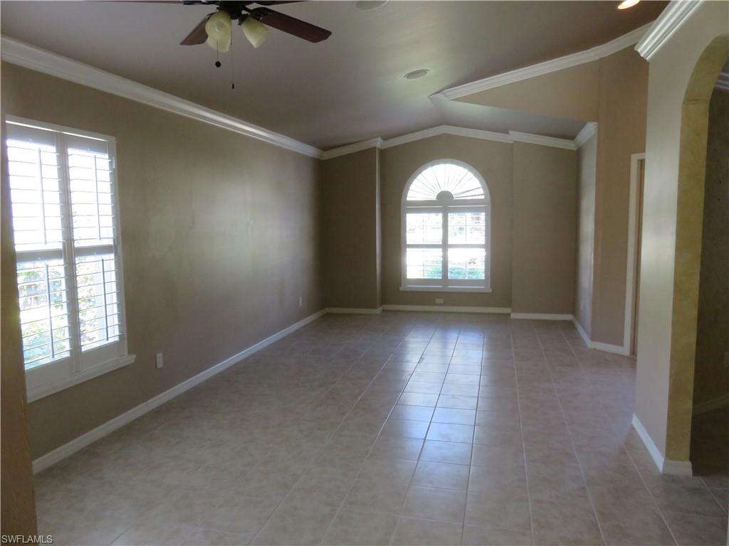 21711 Brixham Run Loop Estero, FL 33928 - Photo 8 of 28 Dining/Living Room