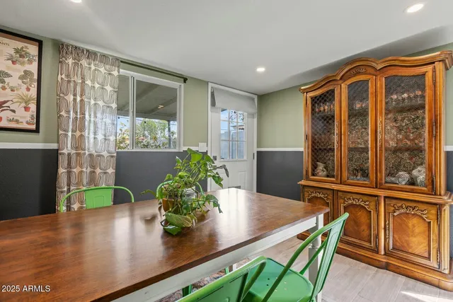 a view of kitchen with furniture and large window