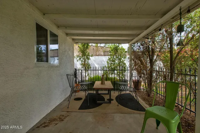 a room with furniture and a large window
