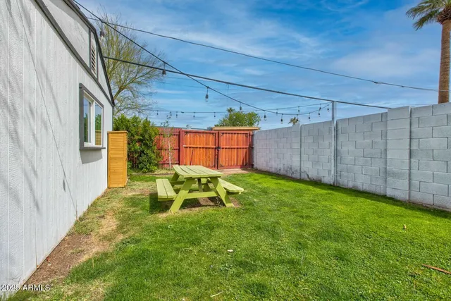 a view of a backyard with a garden