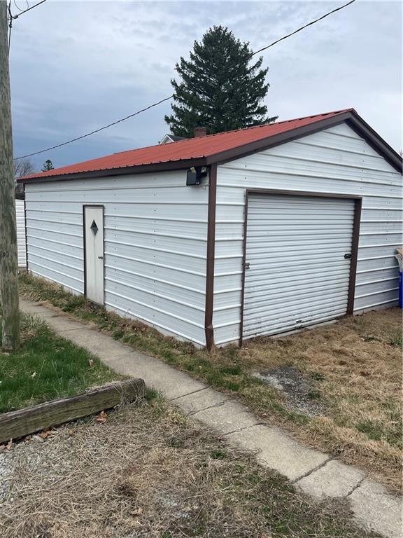 97 A & B United Rd Mount Mount Pleasant, PA 15666 - Photo 2 of 17 a view of a house with backyard