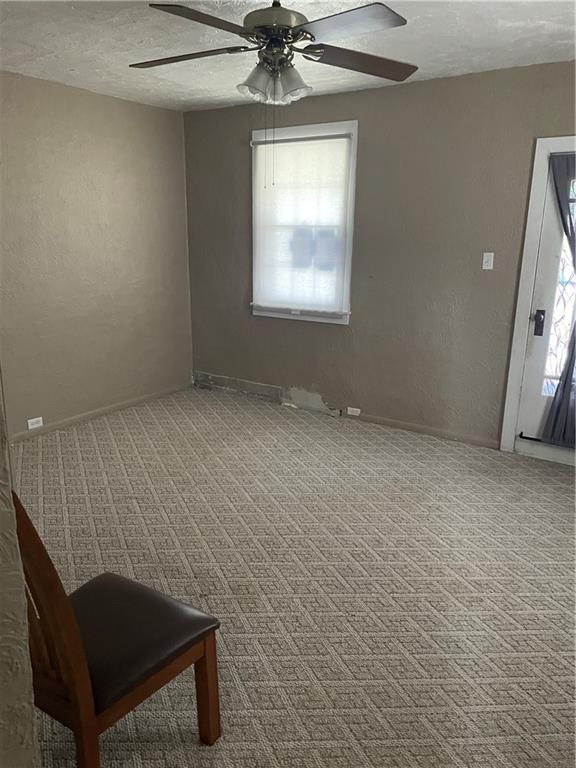 97 A & B United Rd Mount Mount Pleasant, PA 15666 - Photo 6 of 17 a view of an empty room with a window