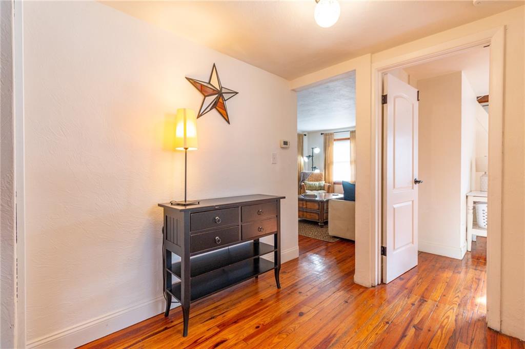 14 John Street Carnegie, PA 15106 - Photo 11 of 41 a living room with furniture and a wooden floor