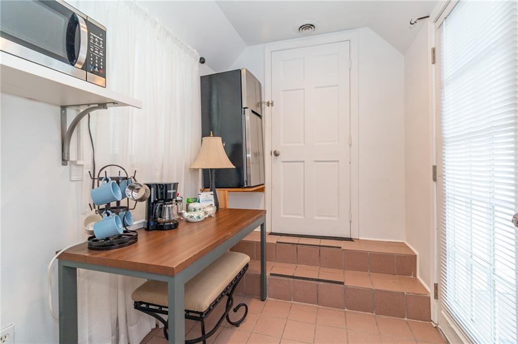 14 John Street Carnegie, PA 15106 - Photo 17 of 41 a room with a table chairs and entryway