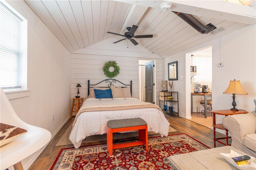 14 John Street Carnegie, PA 15106 - Photo 18 of 41 a bedroom with a bed and wooden floor