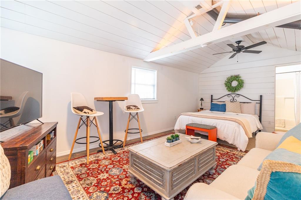 14 John Street Carnegie, PA 15106 - Photo 20 of 41 a bedroom with a bed and a table in it