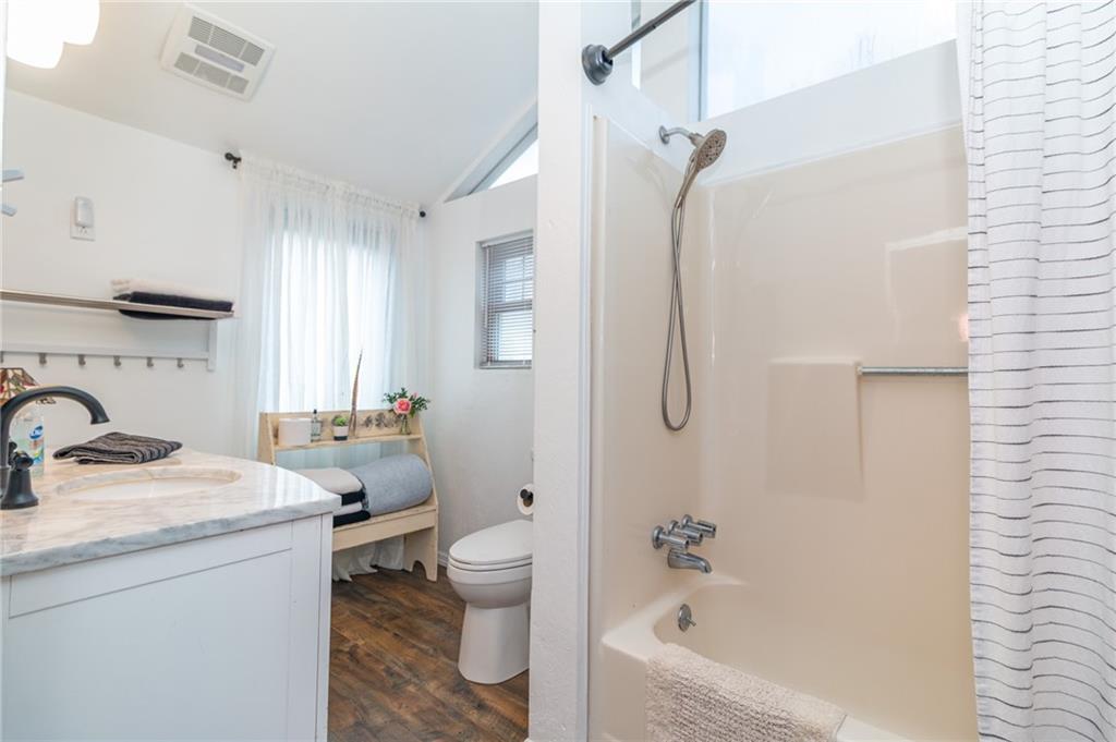 14 John Street Carnegie, PA 15106 - Photo 22 of 41 a bathroom with a granite countertop sink a toilet and shower