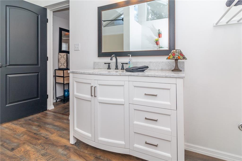 14 John Street Carnegie, PA 15106 - Photo 23 of 41 a bathroom with a sink vanity and mirror