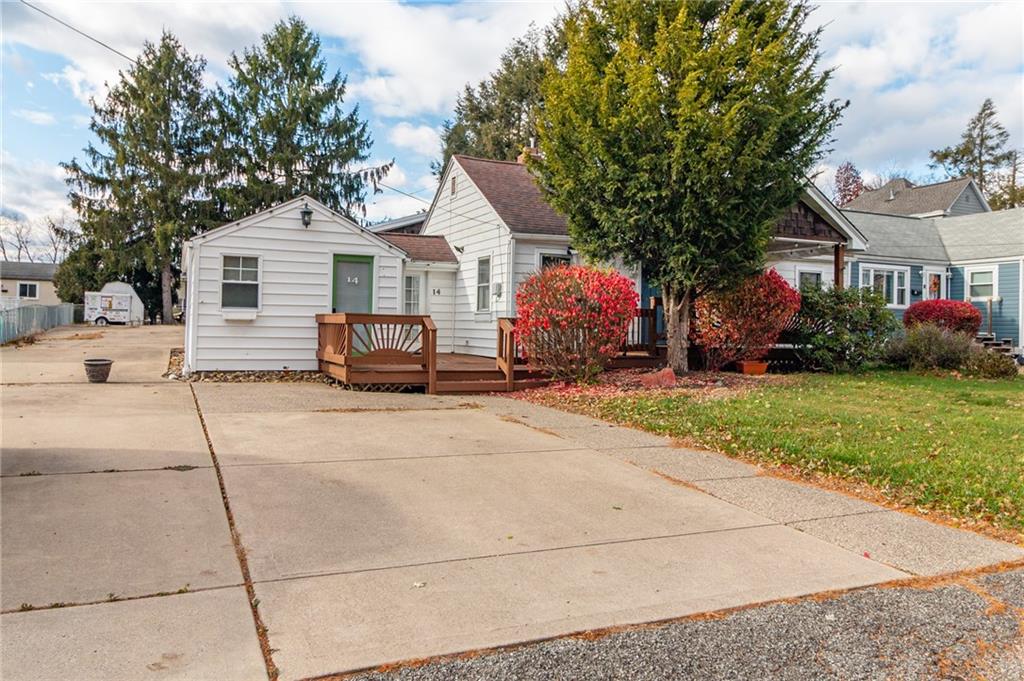 14 John Street Carnegie, PA 15106 - Photo 24 of 41 a front view of a house with a yard and garage