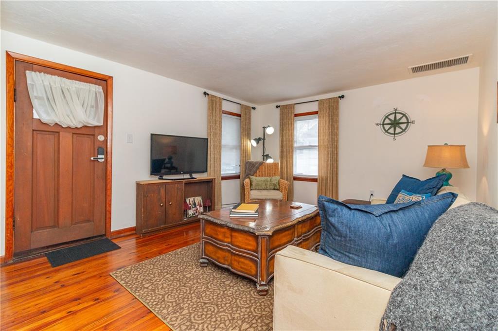 14 John Street Carnegie, PA 15106 - Photo 6 of 41 a living room with furniture and a flat screen tv