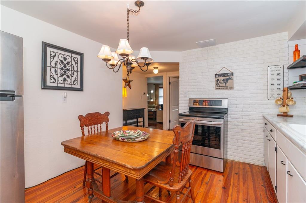 14 John Street Carnegie, PA 15106 - Photo 8 of 41 a kitchen with a table and chairs in it