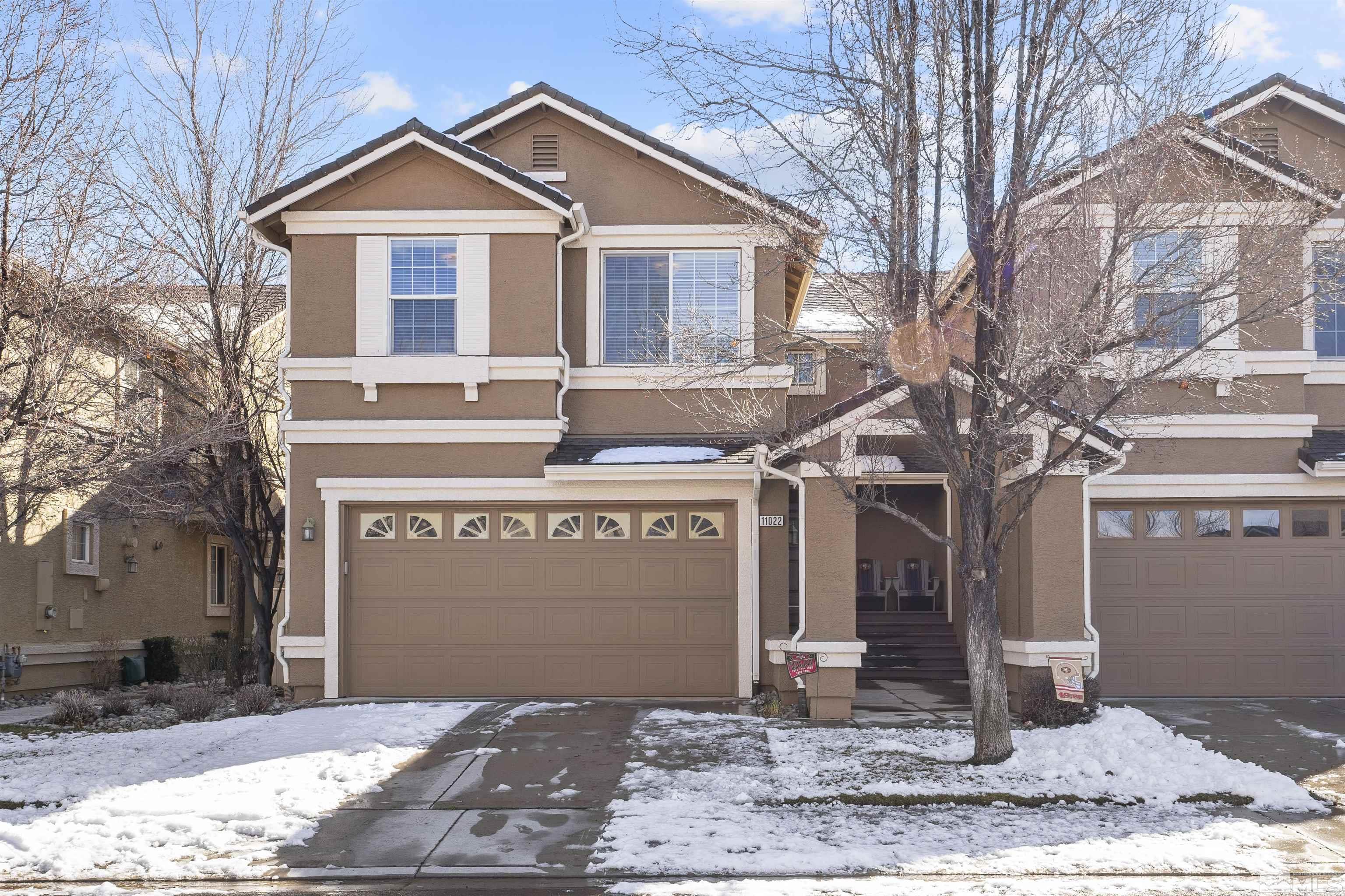11022 Colton Drive Reno, NV 89521 - Photo 1 of 26 a front view of a house with garden