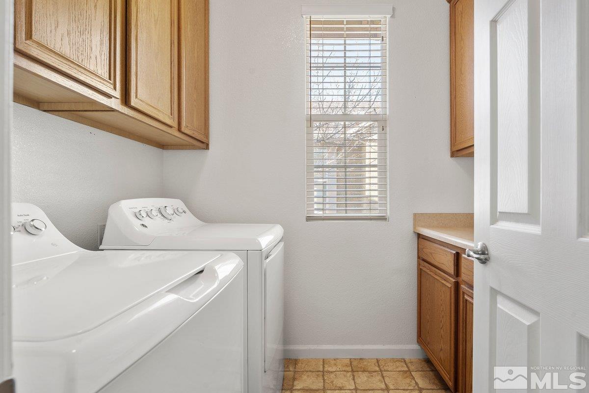 11022 Colton Drive Reno, NV 89521 - Photo 21 of 26 a utility room with dryer and washer
