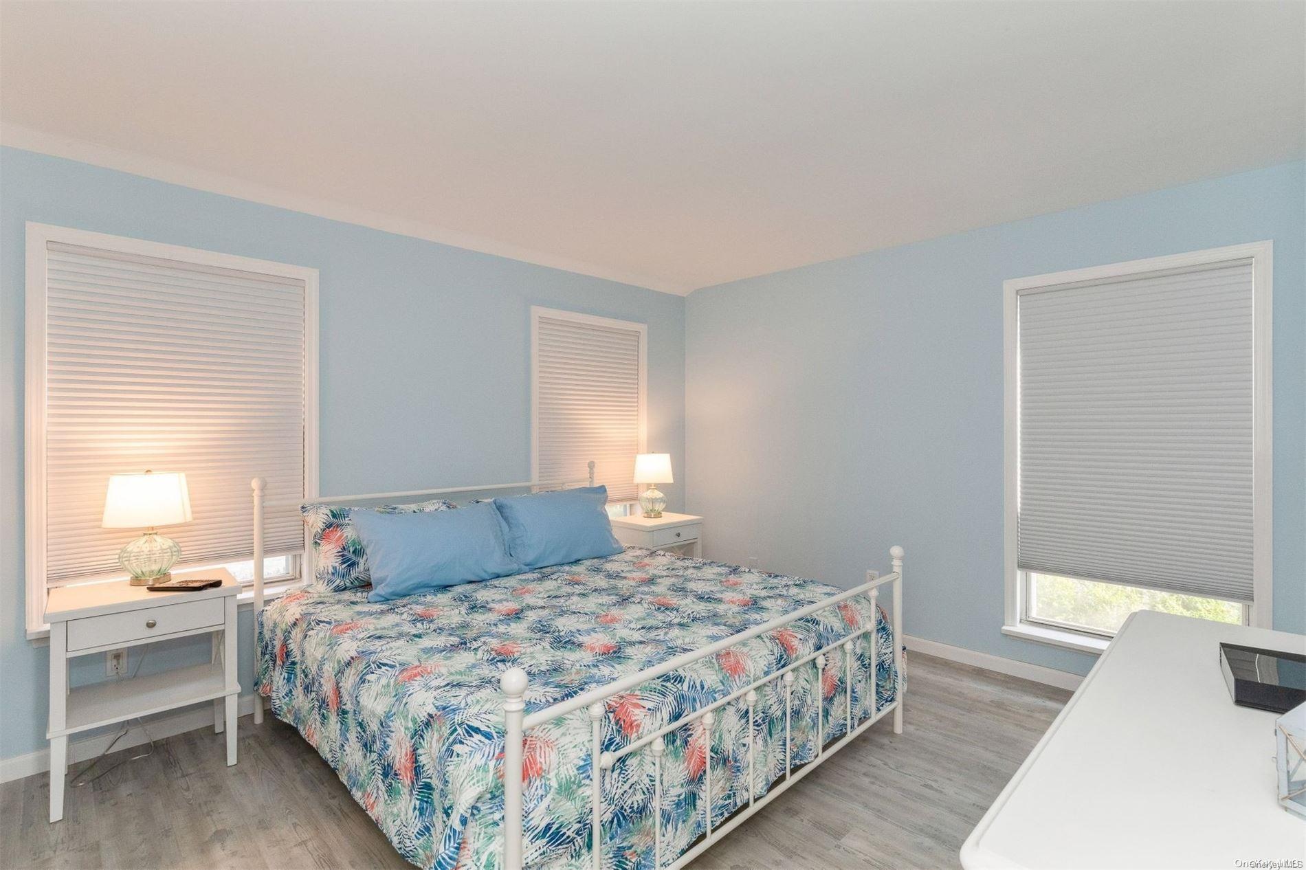 37 Halsey Road Remsenburg, NY 11960 - Photo 9 of 17 a bedroom with a bed and a window