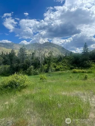 a view of a garden with a building