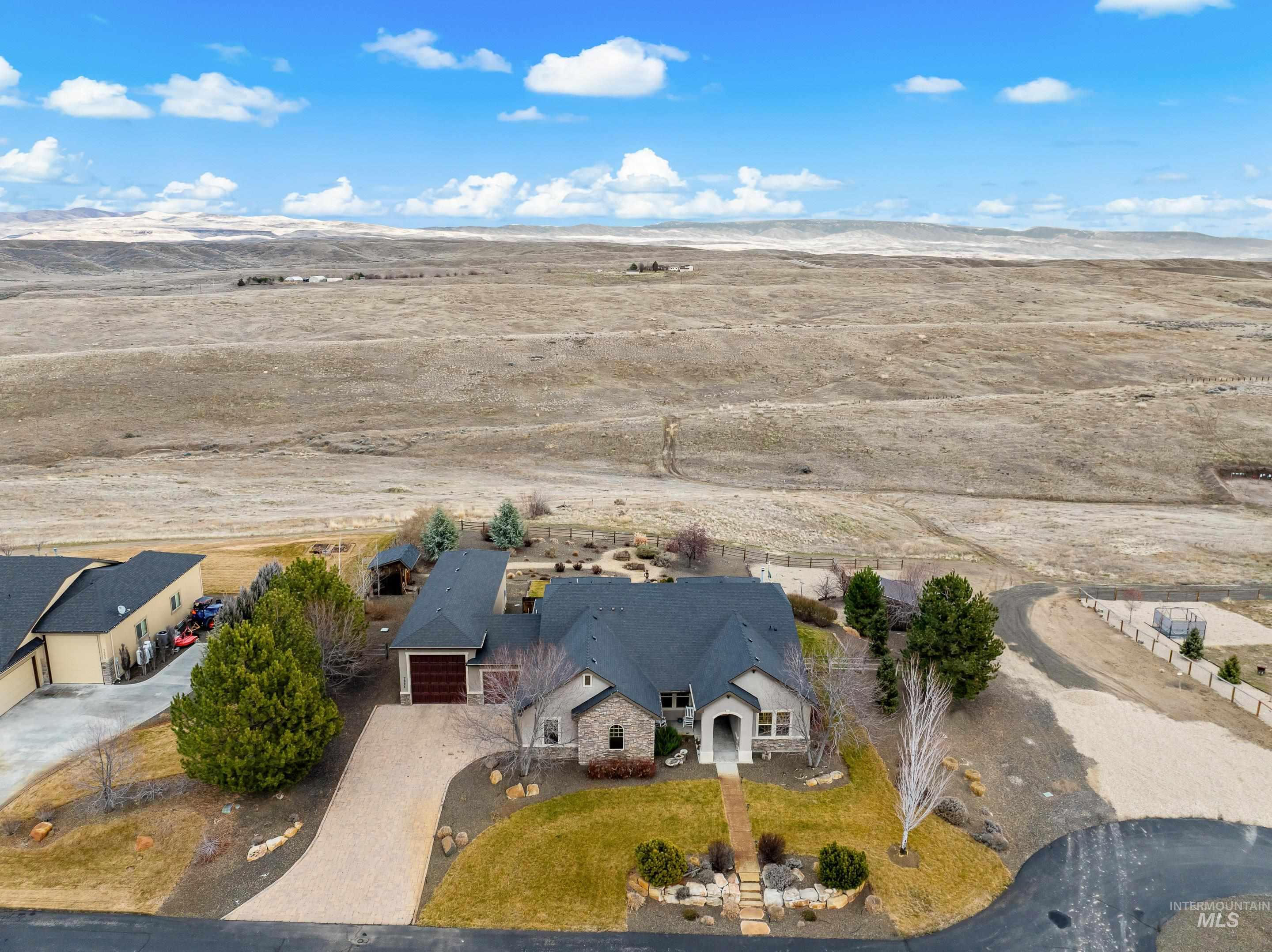 7521 North Grand Ridge Lane Eagle, ID 83616 - Photo 50 of 50 Overview of rural landscape with a desert landscape and a mountainous background