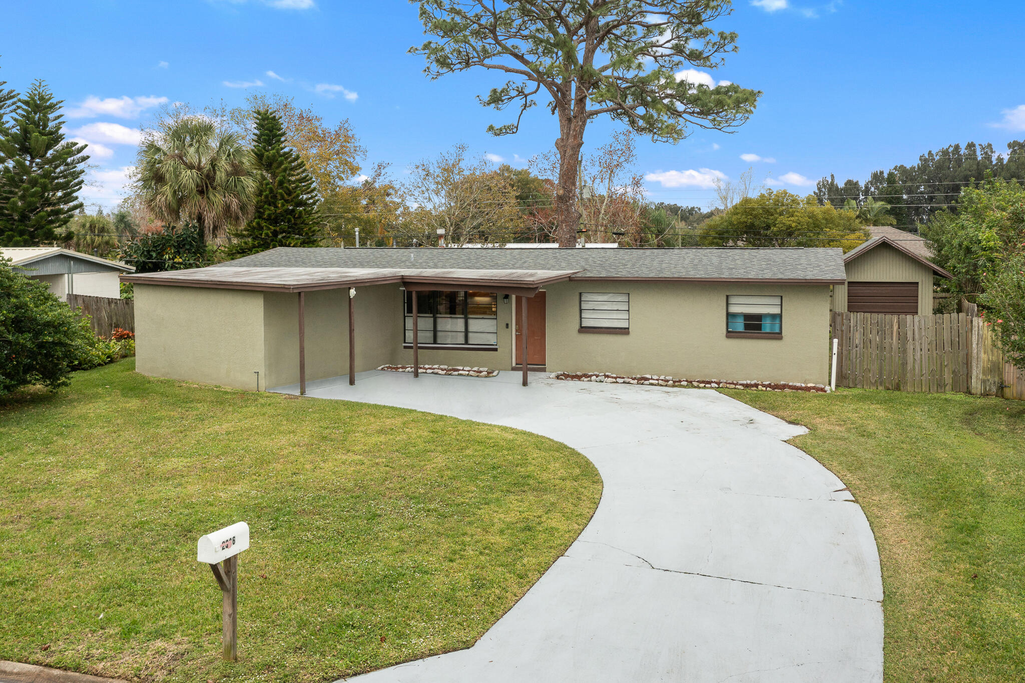 a house view with a garden space
