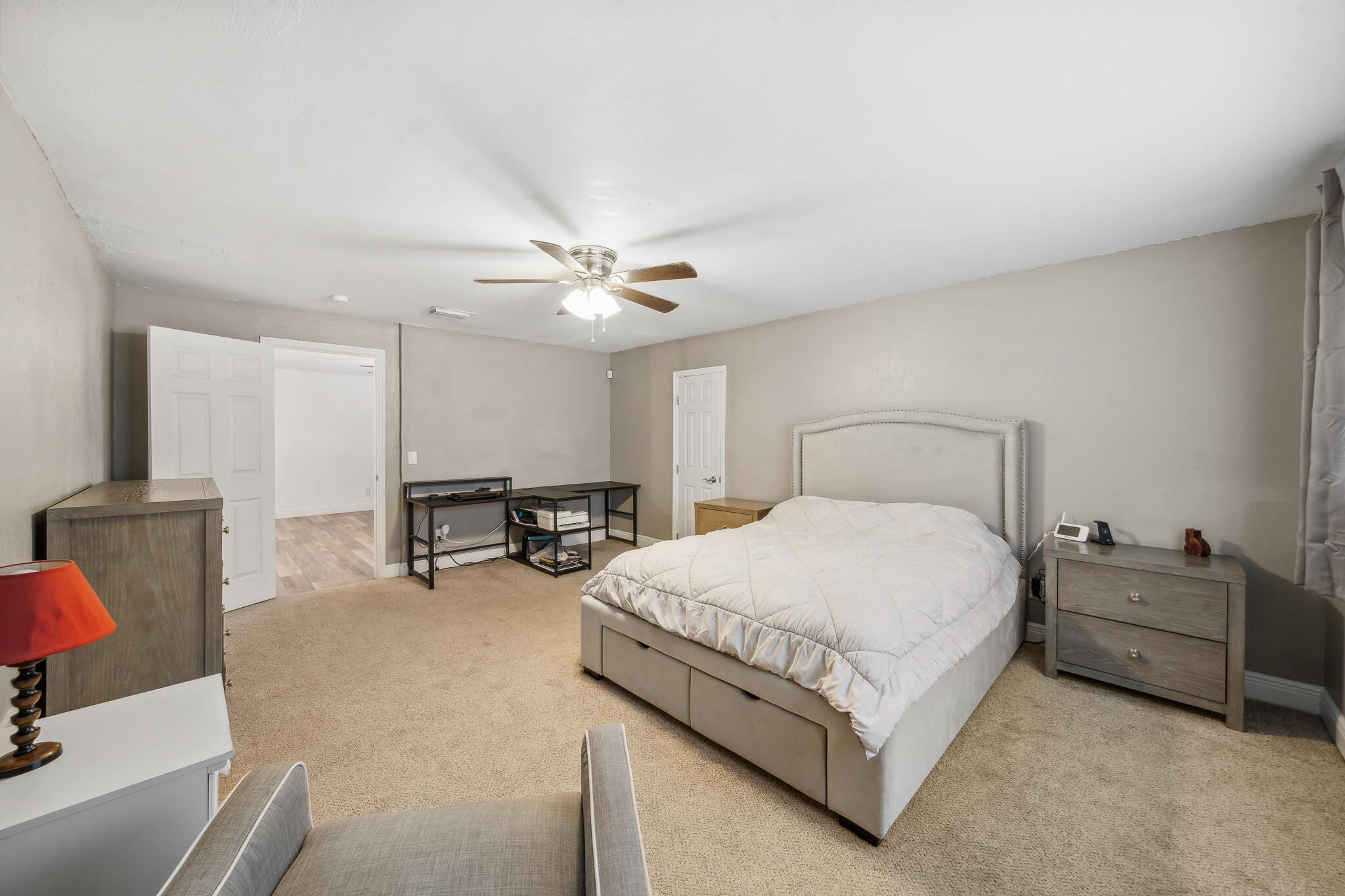 2936 Shepard Drive Rockledge, FL 32955 - Photo 12 of 25 a bedroom with a bed a chair and couch