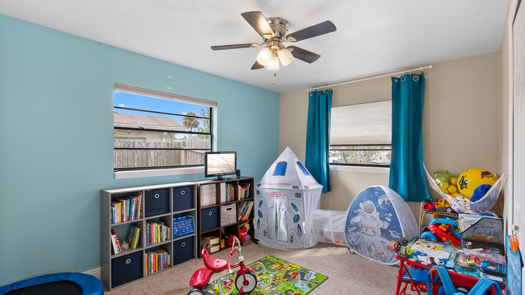 2936 Shepard Drive Rockledge, FL 32955 - Photo 16 of 25 a view of a workspace with furniture and toys