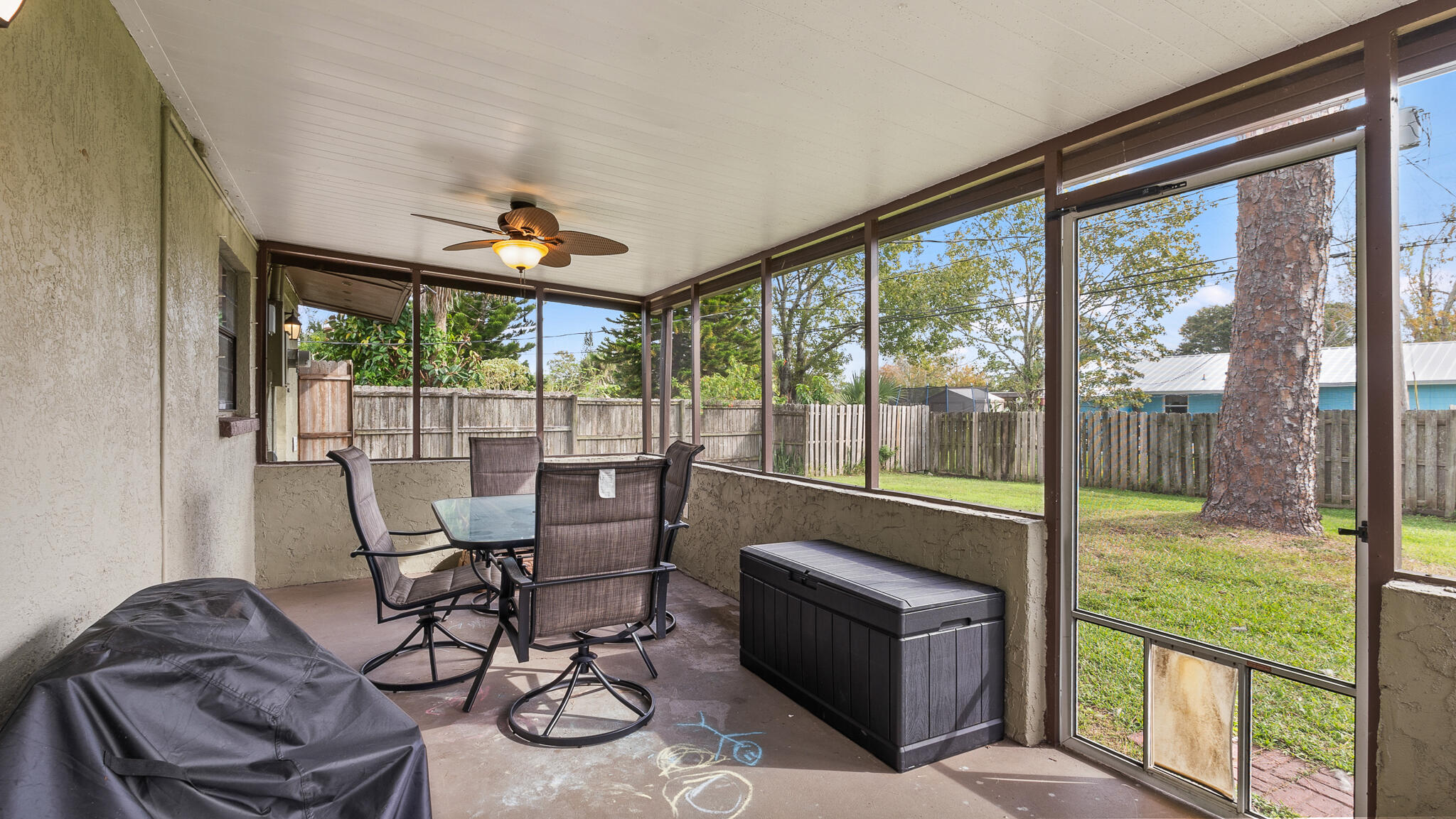 2936 Shepard Drive Rockledge, FL 32955 - Photo 20 of 25 a room with furniture and large windows