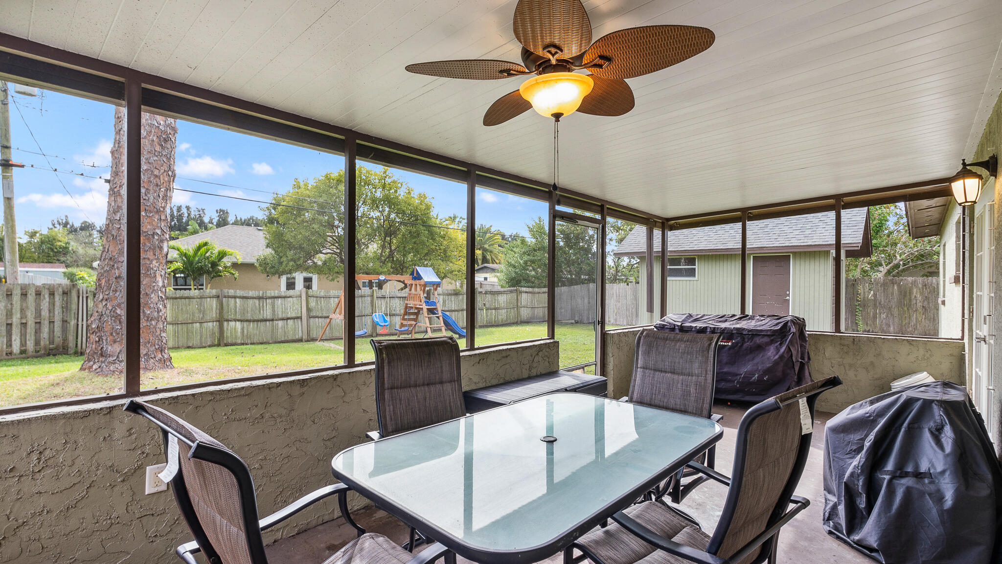 2936 Shepard Drive Rockledge, FL 32955 - Photo 21 of 25 a view of a dining room with furniture window and outside view