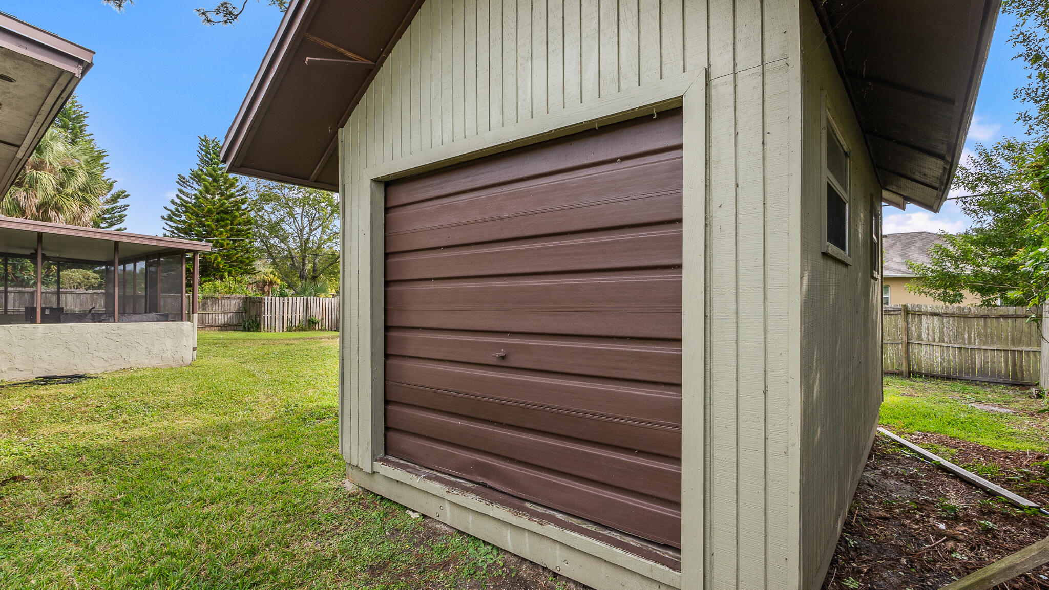 2936 Shepard Drive Rockledge, FL 32955 - Photo 22 of 25 a view of house with backyard