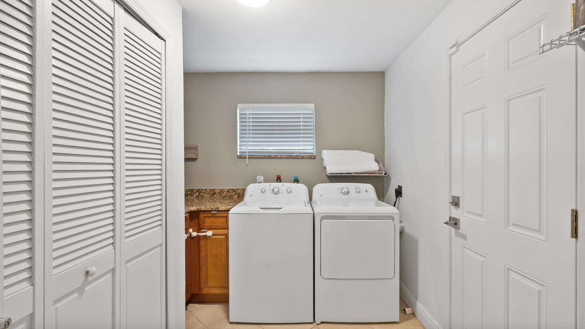 2936 Shepard Drive Rockledge, FL 32955 - Photo 9 of 25 a utility room with dryer and washer