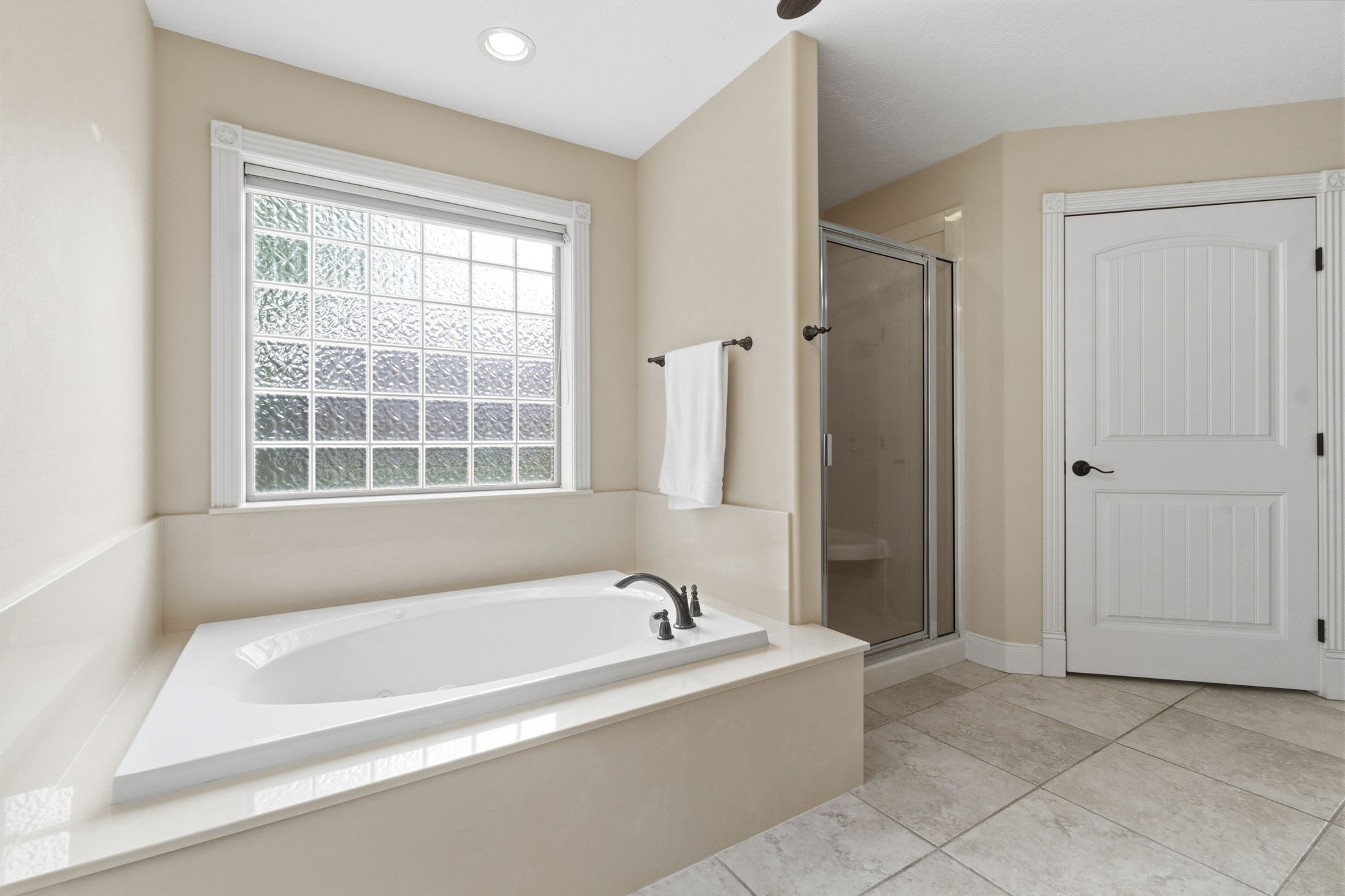 259 Memphis Bell Lane Trinity, TX 75862 - Photo 18 of 50 a spacious bathroom with a bathtub and a shower