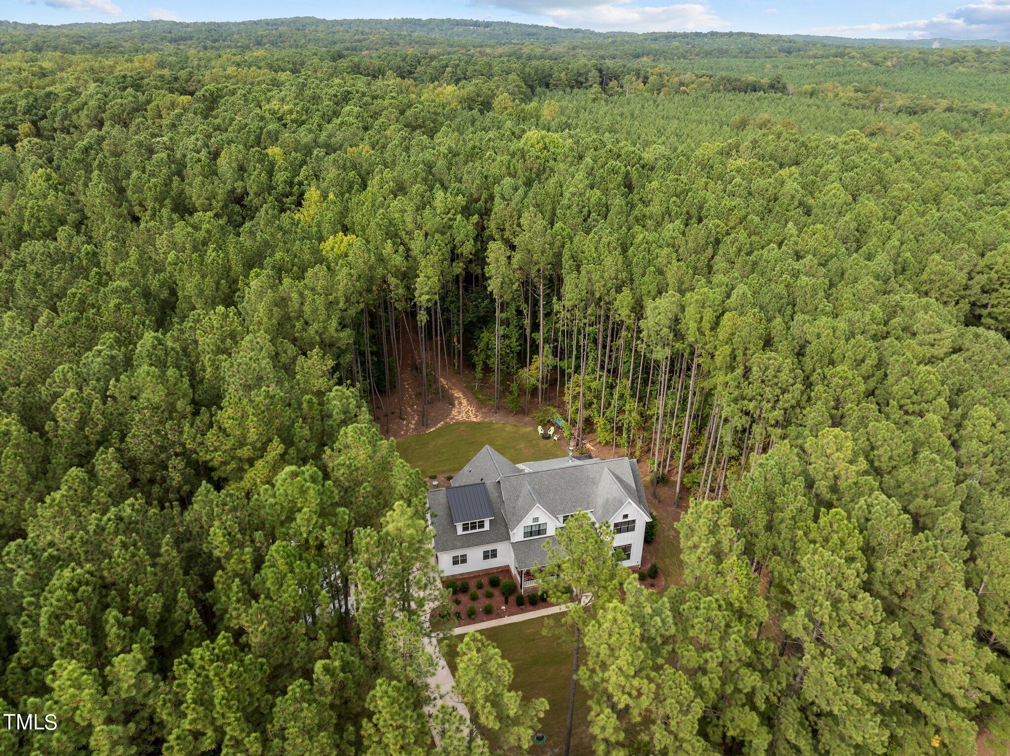 6118 Sibling Pine Drive Durham, NC 27705 - Photo 4 of 40 aerial home 3.16 acres